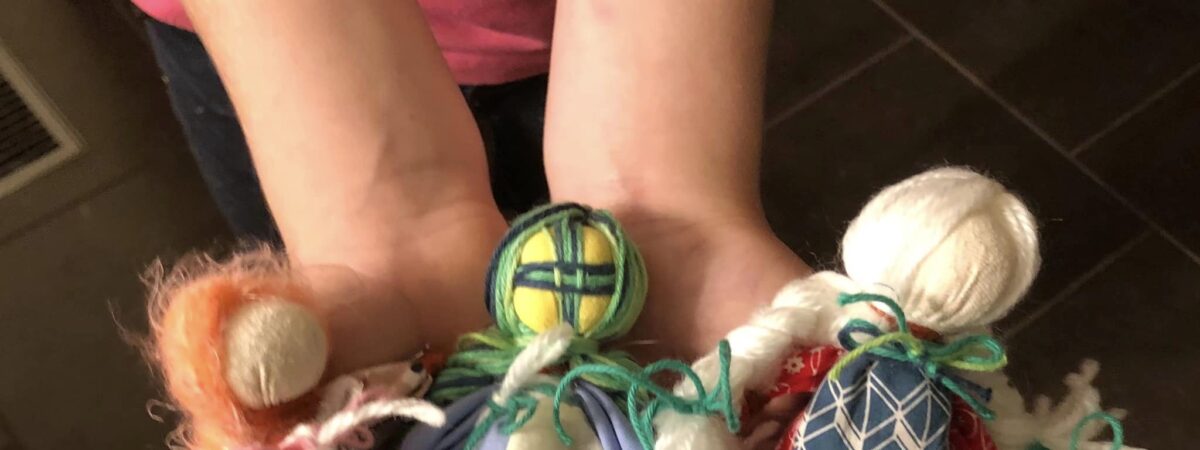 Doll samples in hands