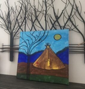 Acrylic painting of a tipi beneath a bare tree against a blue sky, resting in front of a metal tree sculpture