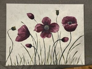 Acrylic painting of dark red poppies and grasses on a cream canvas